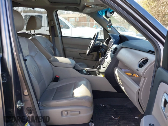 2014 Honda Pilot Touring with VIN 5FNYF4H95EB019048, listed as a IAAI auction lot 41526958 with 172,252 mi miles and . Bid and sale history available at DreamBid. Image 5.
