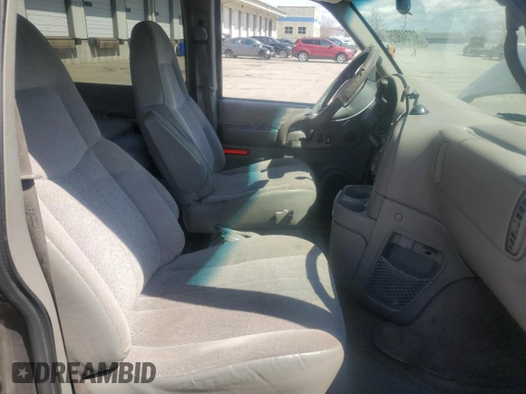 2003 GMC Safari z VIN 1GKDM19XX3B514754, wystawiony jako Copart lot #50744805 z przebiegiem 142 216 mil mil oraz Szkoda całkowita • Salvage title. Historia ofert i sprzedaży dostępna na DreamBid. Obrazek 7.