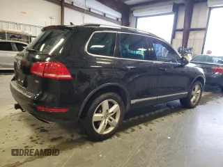 2011 Volkswagen Touareg Exec with VIN WVGFK9BP8BD003948, listed as a Copart auction lot 48285065 with 152,497 mi miles and Salvage Title. Bid and sale history available at DreamBid. Image 3.