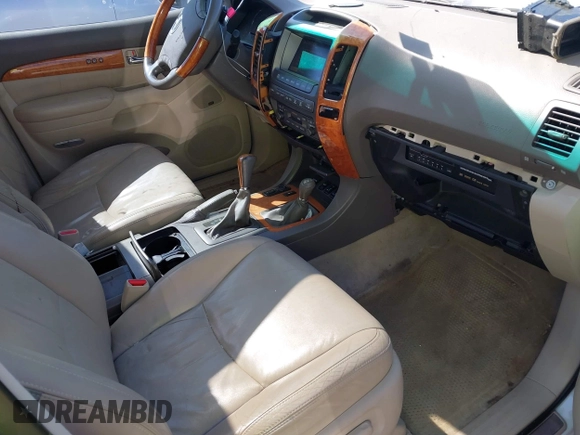 2007 Lexus GX with VIN JTJBT20X570145387, listed as a IAAI auction lot 42016545 with 153,907 mi miles and . Bid and sale history available at carsss.com. Image 5.