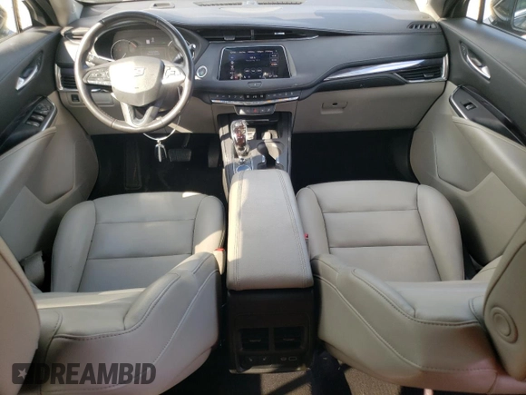 2023 Cadillac XT4 AWD Luxury with VIN 1GYFZBR49PF101377, listed as a Copart auction lot 73961294 with 26,847 mi miles and Salvage Title. Bid and sale history available at carsss.com. Image 8.