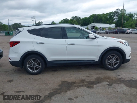 2018 Hyundai Santa Fe 2.4L z VIN 5XYZUDLB1JG543837, wystawiony jako IAAI lot #42235471 z przebiegiem 157 909 mil mil oraz . Historia ofert i sprzedaży dostępna na DreamBid. Obrazek 13.