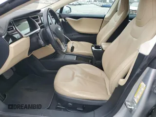 2014 Tesla Model S 60 with VIN 5YJSA1H14EFP34335, listed as a Copart auction lot 65504325 with Not provided miles and Clean title. Bid and sale history available at DreamBid. Image 7.