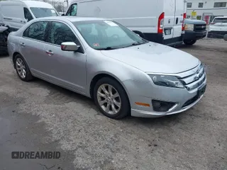 2011 Ford Fusion SEL with VIN 3FAHP0CG7BR170341, listed as a IAAI auction lot 42034192 with 128,279 mi miles. Bid and sale history available at carsss.com. Image 1.