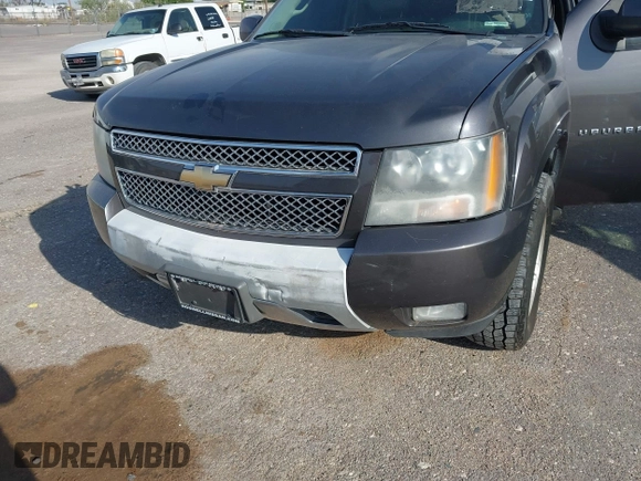 2011 Chevrolet Suburban LT with VIN 1GNSKJE34BR242629, listed as a IAAI auction lot 42043276 with 197,722 mi miles and . Bid and sale history available at DreamBid. Image 6.