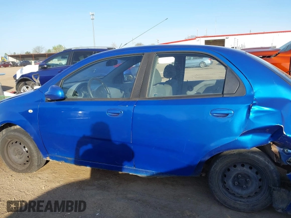 2005 Chevrolet Aveo LS with VIN KL1TD52665B289064, listed as a IAAI auction lot 42099766 with 114,001 mi miles and . Bid and sale history available at DreamBid. Image 14.