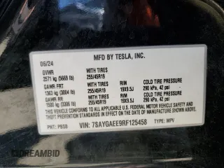 2024 Tesla Model Y Long Range with VIN 7SAYGAEE9RF125458, listed as a Copart auction lot 59567365 with 28,966 mi miles and Salvage title. Bid and sale history available at DreamBid. Image 13.