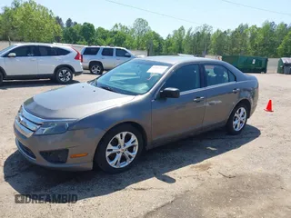 2012 Ford Fusion SE z VIN 3FAHP0HA4CR232641, wystawiony jako IAAI lot #42057070 z przebiegiem 180 793 mil mil oraz . Historia ofert i sprzedaży dostępna na DreamBid. Obrazek 18.