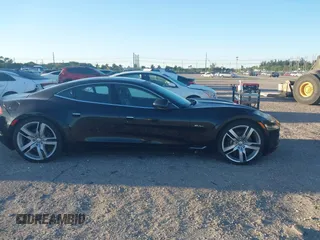 2012 Fisker Karma EcoSport z VIN YH4K14AA0CA000444, wystawiony jako IAAI lot #41749223 z przebiegiem 69 793 mil mil oraz . Historia ofert i sprzedaży dostępna na DreamBid. Obrazek 13.
