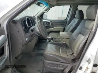 2006 Honda Ridgeline RTL with VIN 2HJYK16506H570523, listed as a Copart auction lot 75746474 with 142,694 mi miles and Salvage Title. Bid and sale history available at carsss.com. Image 7.