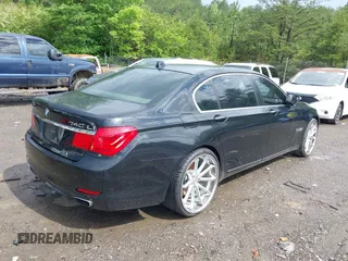 2011 BMW 7 Series 740Li with VIN WBAKB4C5XBC392890, listed as a IAAI auction lot 42108817 with 162,874 mi miles. Bid and sale history available at carsss.com. Image 4.