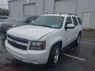 2009 Chevrolet Tahoe 2LT z VIN 1GNFC23059R217780, wystawiony jako IAAI lot #42334678 z przebiegiem 136 182 mil mil oraz . Historia ofert i sprzedaży dostępna na DreamBid. Obrazek 18.