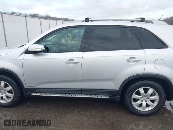 2012 Kia Sorento LX with VIN 5XYKTDA61CG303393, listed as a IAAI auction lot 41137220 with 123,474 mi miles. Bid and sale history available at carsss.com. Image 14.