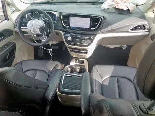 2023 Chrysler Pacifica Hybrid Touring L with VIN 2C4RC1L72PR614075, listed as a Copart auction lot 58586115 with 43,960 mi miles and Salvage title. Bid and sale history available at DreamBid. Image 8.