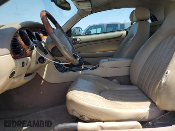 2002 Jaguar XK with VIN SAJDA42C62NA25816, listed as a Copart auction lot 52802525 with Not Provided miles and Salvage Title. Bid and sale history available at DreamBid. Image 7.