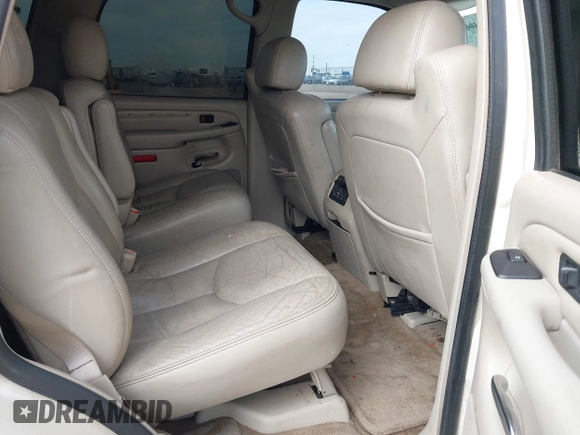 2005 Cadillac Escalade z VIN 1GYEC63T05R133618, wystawiony jako IAAI lot #41540610 z przebiegiem 212 947 mil mil oraz . Historia ofert i sprzedaży dostępna na DreamBid. Obrazek 8.