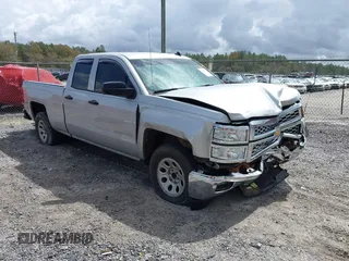 2014 Chevrolet Silverado 1500 LT with VIN 1GCRCREC7EZ321610, listed as a IAAI auction lot 41754959 with 203,264 mi miles and . Bid and sale history available at DreamBid. Image 1.