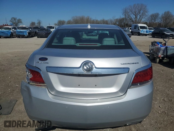 2013 Buick LaCrosse Premium 2 z VIN 1G4GH5E34DF172876, wystawiony jako Copart lot #51674275 z przebiegiem 151 280 mil mil oraz Szkoda całkowita • Salvage title. Historia ofert i sprzedaży dostępna na DreamBid. Obrazek 6.