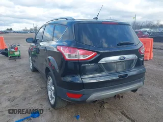 2015 Ford Escape Titanium with VIN 1FMCU9J96FUC11476, listed as a IAAI auction lot 41967914 with 149,341 mi miles. Bid and sale history available at carsss.com. Image 3.