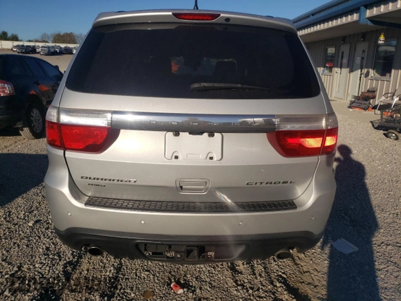 2011 Dodge Durango Citadel с VIN 1D4SE5GT7BC638385, выставлен на аукционе Copart как лот 76947344 с пробегом 159 164 миль миль и На запчасти • Non repairable. История ставок и продаж доступна на DreamBid. Изображение 6.