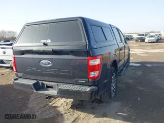 2023 Ford F-150 XL with VIN 1FTEW1CP2PKD67533, listed as a IAAI auction lot 41663214 with 61,296 mi miles. Bid and sale history available at carsss.com. Image 4.