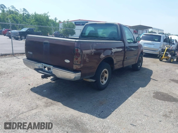 2000 Ford F-150 XL with VIN 1FTZF1721YNB05244, listed as a IAAI auction lot 42298391 with Not provided miles and . Bid and sale history available at DreamBid. Image 4.