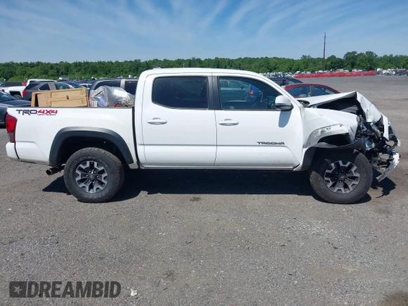 2016 Toyota Tacoma SR with VIN 3TMCZ5AN0GM003224, listed as a IAAI auction lot 42289910 with 140,899 mi miles and . Bid and sale history available at DreamBid. Image 13.