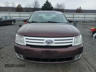 2009 Ford Taurus SE with VIN 1FAHP23W89G125025, listed as a Copart auction lot 80710004 with 114,176 mi miles and Salvage Title. Bid and sale history available at carsss.com. Image 5.