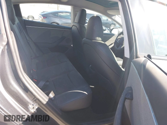 2024 Tesla Model 3 with VIN 5YJ3E1EA7RF717855, listed as a IAAI auction lot 41838814 with 8,750 mi miles and . Bid and sale history available at DreamBid. Image 8.