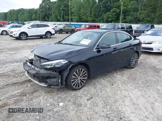 2021 BMW 2 Series 228i with VIN WBA53AK09M7H83705, listed as a IAAI auction lot 42507193 with 82,055 mi miles and . Bid and sale history available at DreamBid. Image 2.