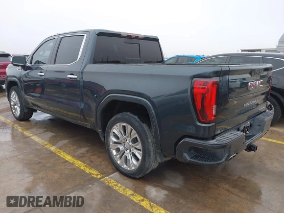 2020 GMC Sierra 1500 Denali z VIN 1GTU9FEL1LZ120581, wystawiony jako IAAI lot #41428827 z przebiegiem 97 917 mil mil oraz . Historia ofert i sprzedaży dostępna na DreamBid. Obrazek 3.