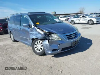 2008 Honda Odyssey EX-L z VIN 5FNRL38718B065504, wystawiony jako IAAI lot #41397918 z przebiegiem 141 835 mil mil oraz . Historia ofert i sprzedaży dostępna na DreamBid. Obrazek 1.