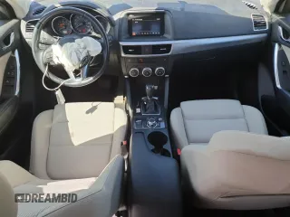 2016 Mazda CX-5 Touring z VIN JM3KE4CY8G0758947, wystawiony jako Copart lot #53140005 z przebiegiem 47 172 mil mil oraz Szkoda całkowita • Salvage title. Historia ofert i sprzedaży dostępna na DreamBid. Obrazek 8.