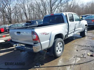 2013 Toyota Tacoma with VIN 3TMMU4FN8DM054973, listed as a IAAI auction lot 41659232 with 113,734 mi miles. Bid and sale history available at carsss.com. Image 4.