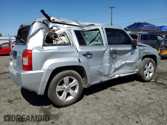 2009 Jeep Patriot Sport z VIN 1J4FT28A59D167643, wystawiony jako Copart lot #49856125 z przebiegiem 186 838 mil mil oraz Szkoda całkowita • Salvage title. Historia ofert i sprzedaży dostępna na DreamBid. Obrazek 3.