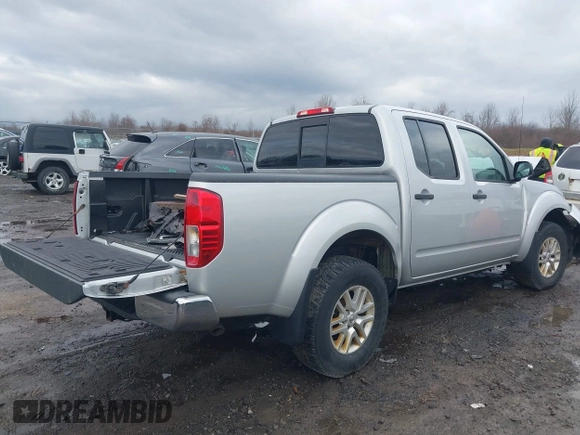 2018 Nissan Frontier Pro-4X with VIN 1N6AD0EV4JN737409, listed as a IAAI auction lot 41903169 with 145,479 mi miles and . Bid and sale history available at DreamBid. Image 4.