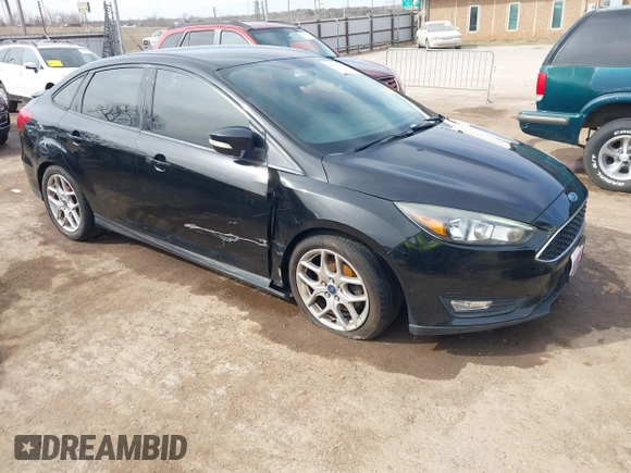 2015 Ford Focus SE with VIN 1FADP3F26FL356554, listed as a IAAI auction lot 41773139 with 143,911 mi miles. Bid and sale history available at carsss.com. Image 1.