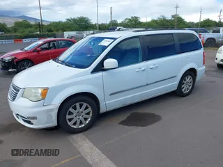 2014 Chrysler Town & Country Touring with VIN 2C4RC1BG1ER242842, listed as a IAAI auction lot 42043861 with 102,448 mi miles. Bid and sale history available at carsss.com. Image 2.
