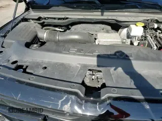 2021 Ram 1500 Lone Star z VIN 1C6RREFT6MN660409, wystawiony jako Copart lot #69176465 z przebiegiem 66 950 mil mil oraz Szkoda całkowita • Salvage title. Historia ofert i sprzedaży dostępna na DreamBid. Obrazek 13.