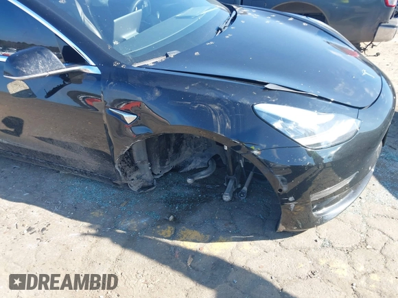 2020 Tesla Model 3 Standard Range Plus with VIN 5YJ3E1EA0LF660759, listed as a IAAI auction lot 41505250 with 63,322 mi miles and . Bid and sale history available at DreamBid. Image 6.
