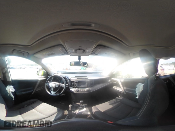 2016 Toyota RAV4 XLE with VIN 2T3RFREV9GW458057, listed as a IAAI auction lot 42651373 with 119,750 mi miles and . Bid and sale history available at DreamBid. Image 19.