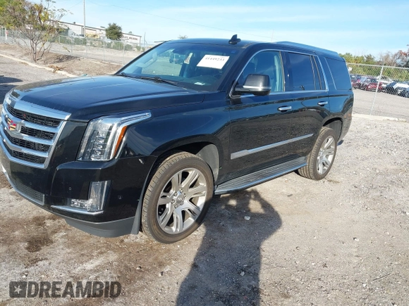2018 Cadillac Escalade Luxury z VIN 1GYS3BKJ7JR291430, wystawiony jako IAAI lot #41449233 z przebiegiem 128 281 mil mil oraz . Historia ofert i sprzedaży dostępna na DreamBid. Obrazek 2.
