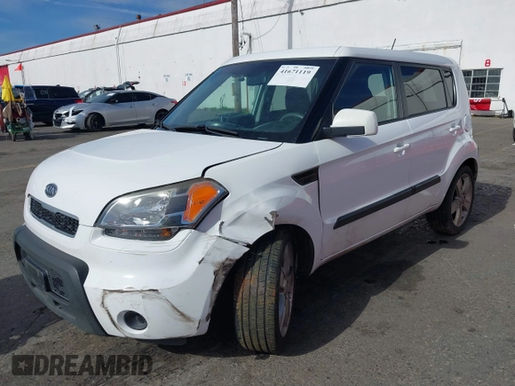 2011 Kia Soul + with VIN KNDJT2A23B7267442, listed as a IAAI auction lot 41671119 with 123,577 mi miles. Bid and sale history available at carsss.com. Image 17.