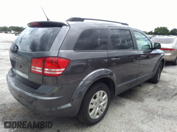 2018 Dodge Journey SE with VIN 3C4PDCAB4JT296083, listed as a IAAI auction lot 41976090 with 63,051 mi miles and . Bid and sale history available at DreamBid. Image 4.