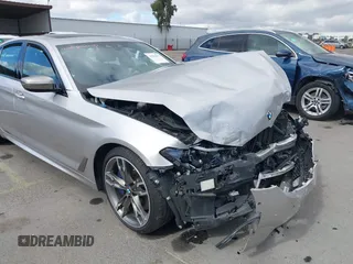 2020 BMW 5 Series M550i xDrive z VIN WBAJS7C07LCD85532, wystawiony jako IAAI lot #41518071 z przebiegiem 57 645 mil mil oraz . Historia ofert i sprzedaży dostępna na DreamBid. Obrazek 18.