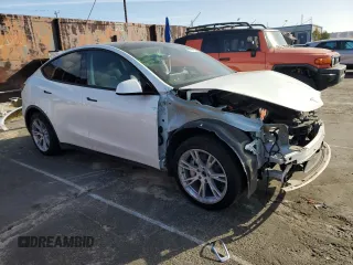 2023 Tesla Model Y Long Range with VIN 7SAYGAEE7PF619170, listed as a Copart auction lot 47647585 with 35,674 mi miles and Salvage Title. Bid and sale history available at DreamBid. Image 4.