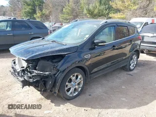 2016 Ford Escape Titanium with VIN 1FMCU9JX4GUB38303, listed as a IAAI auction lot 41788421 with 138,511 mi miles and . Bid and sale history available at DreamBid. Image 23.