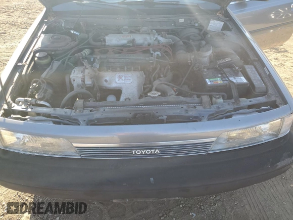 1989 Toyota Camry z VIN JT2SV21E8K0314703, wystawiony jako Copart lot #76053194 z przebiegiem 124 873 mil mil oraz Nie do naprawy • Non repairable. Historia ofert i sprzedaży dostępna na DreamBid. Obrazek 11.