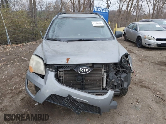 2009 Kia Sportage LX with VIN KNDJF724997570871, listed as a IAAI auction lot 41003267 with 231,654 mi miles and . Bid and sale history available at carsss.com. Image 12.