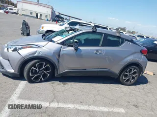 2019 Toyota C-HR XLE with VIN JTNKHMBX8K1046347, listed as a IAAI auction lot 42140743 with 49,918 mi miles and . Bid and sale history available at DreamBid. Image 13.